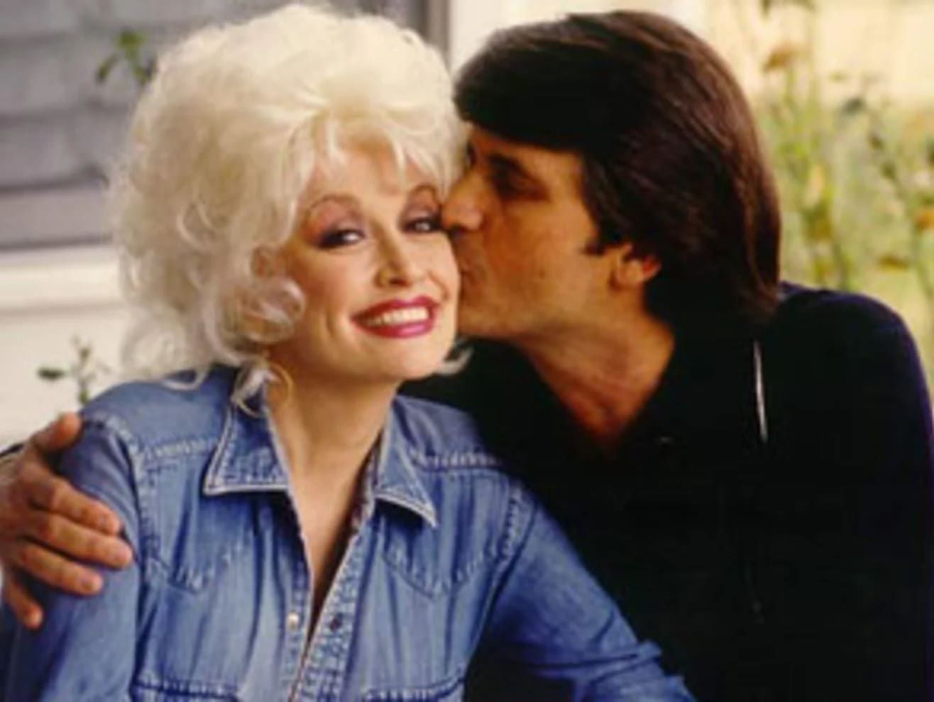 Dolly Parton is seen here with her husband