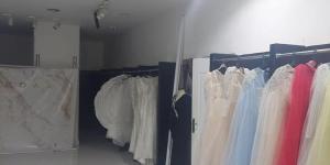 بالبلدي : غلق وتشميع مصنع الملكة لفساتين الزفاف بمدنية مصر