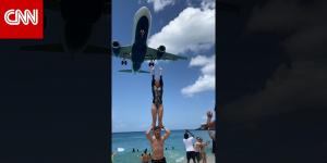 BELBALADY: طائرات تهبط فوق رؤوس المصطافين على شاطئ "ماهو" الكاريبي.. شاهد ما فعله هذا المصور وصديقته هناك